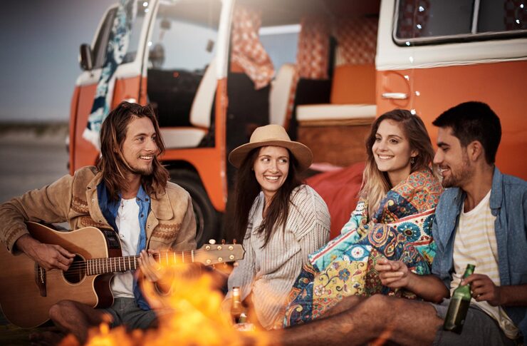 friends-around-flame-is-always-fun-cropped-shot-group-friends-sitting-around-fire-beach_590464-65616